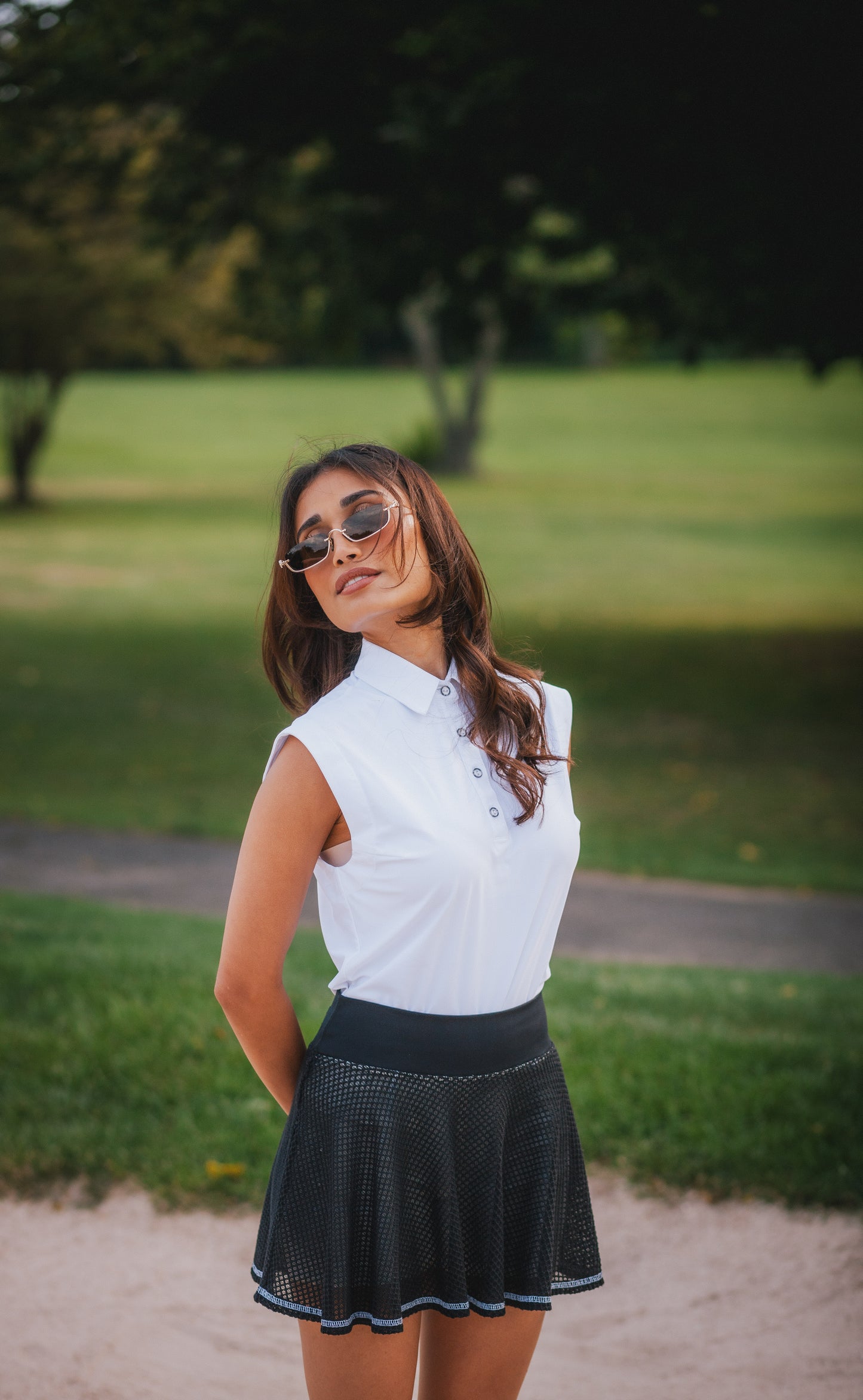 women's 4-way stretch golf polo. Tennis outfit. athletic collared tank. country club outfit. resort wear