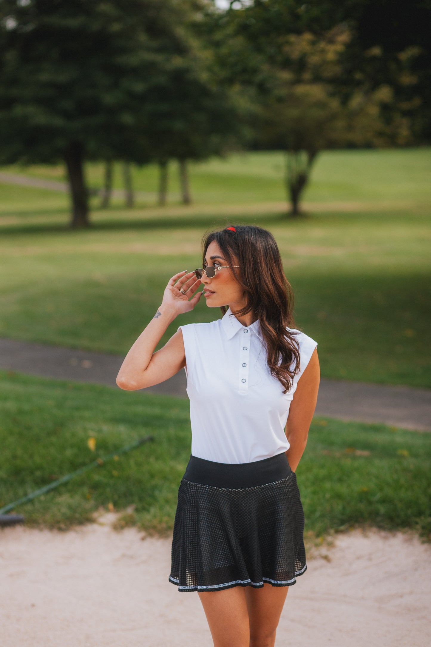 women's 4-way stretch golf polo. Tennis outfit. athletic collared tank. country club outfit. resort wear