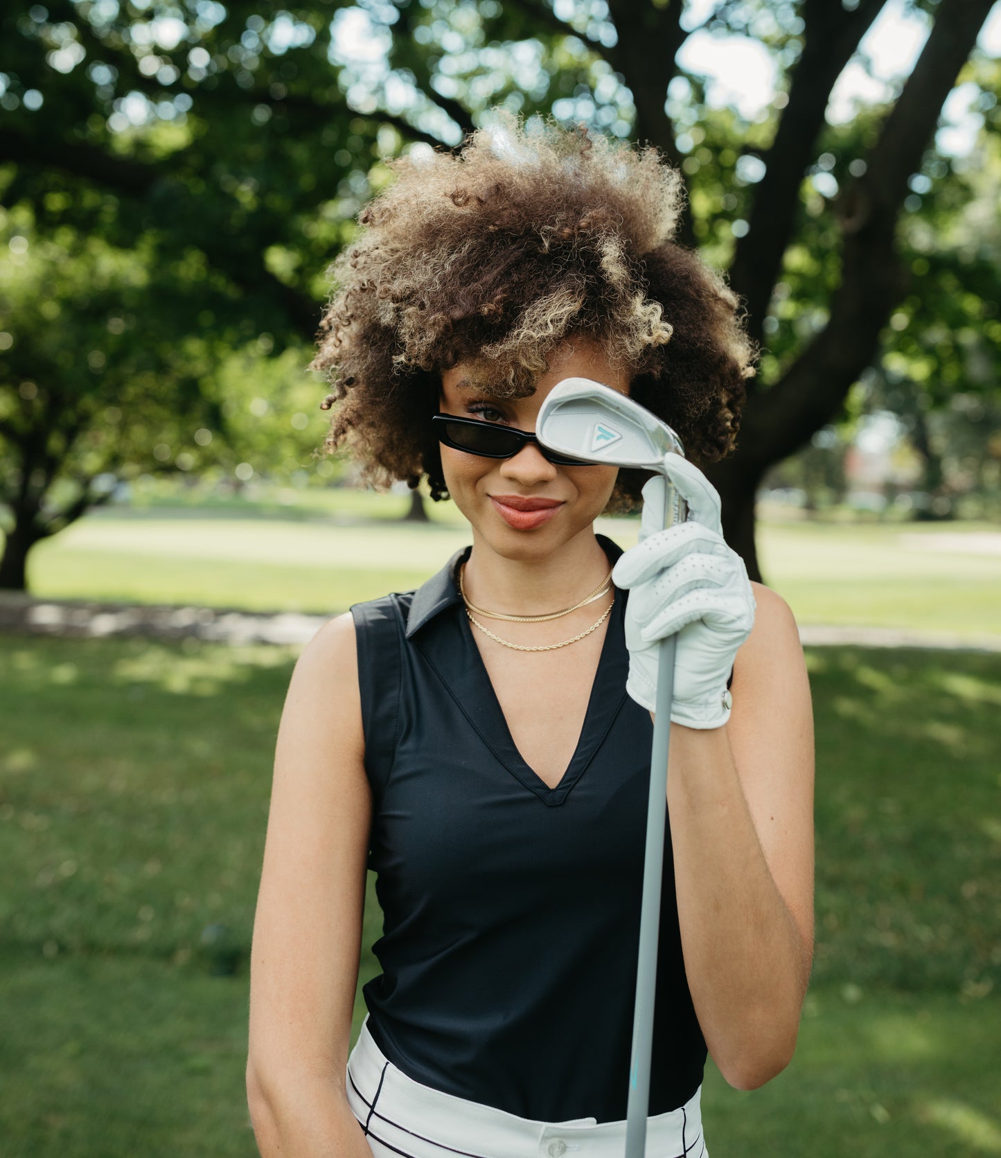 women's 4-way stretch v neck for golf and tennis. athletic collared tank. country club outfit. resort wear