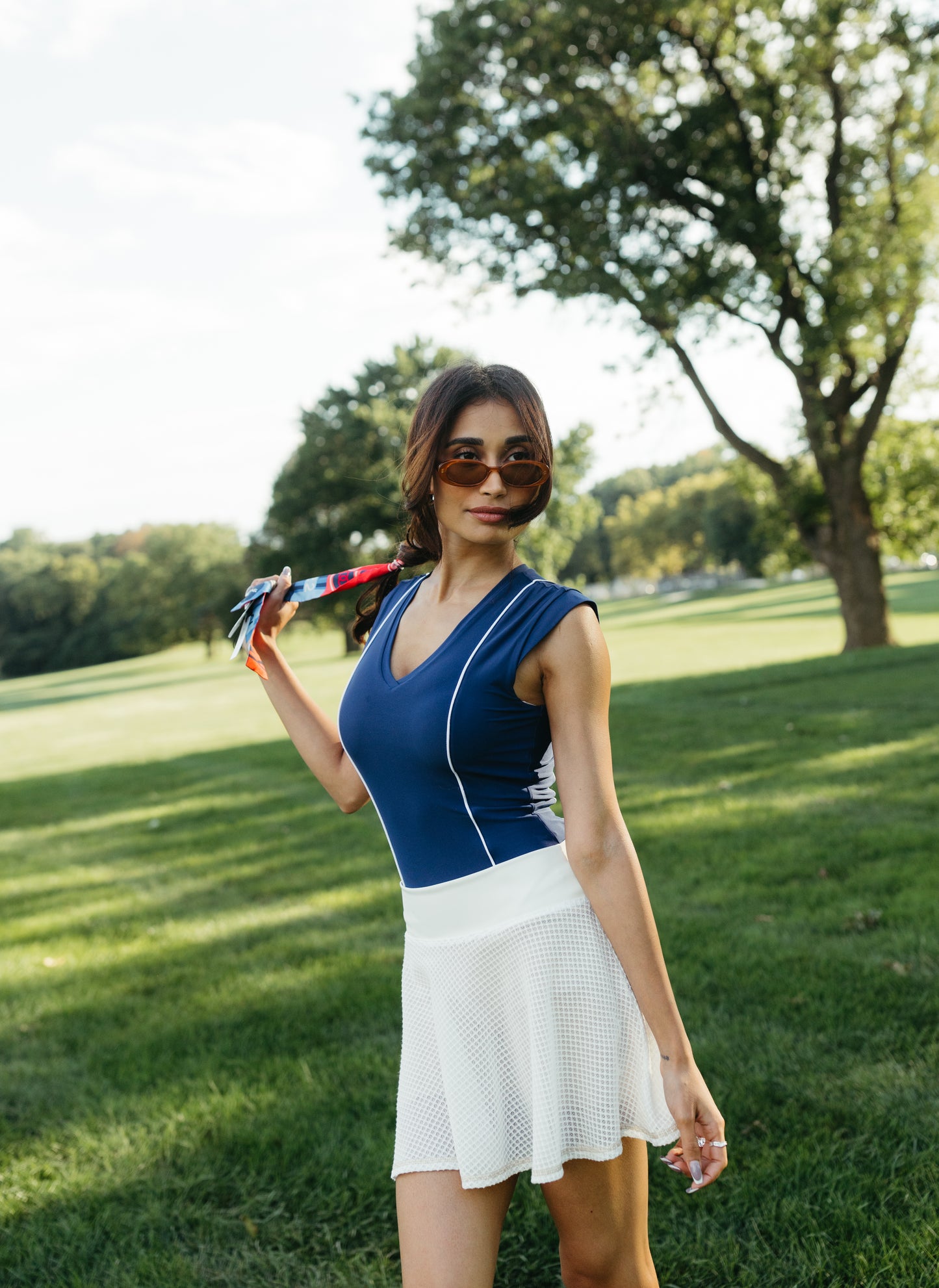 women's 4-way stretch bodysuit for golf and tennis. athletic bodysuit. country club outfit. resort wear